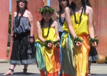 Young girls dancing in streets