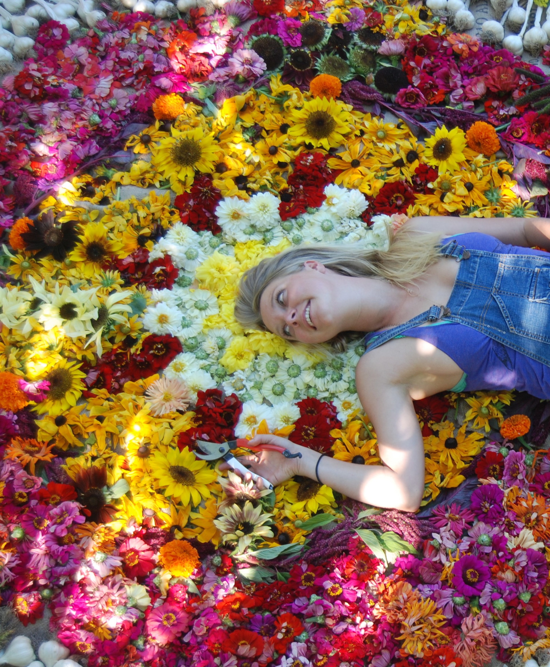 Lady laying in flowers
