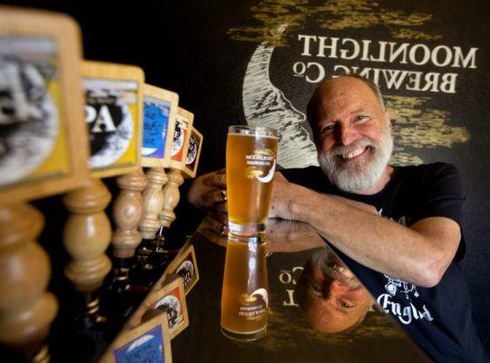 Man pouring craft beer