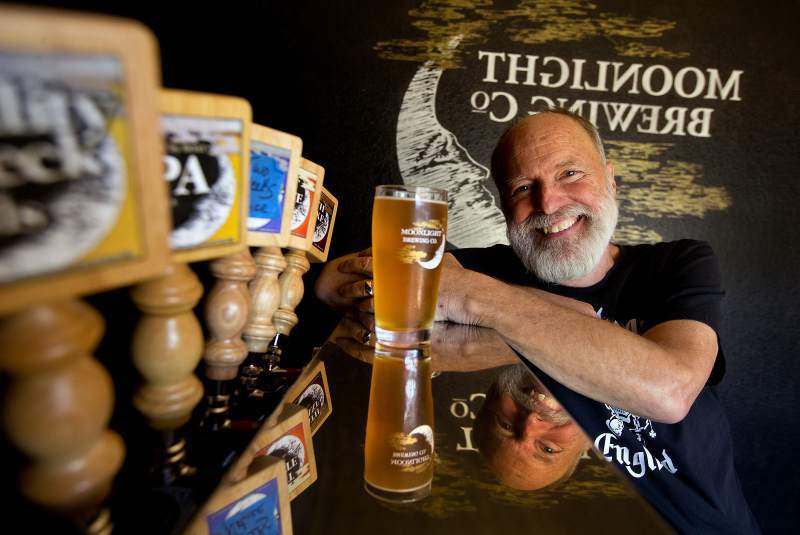 Man pouring craft beer